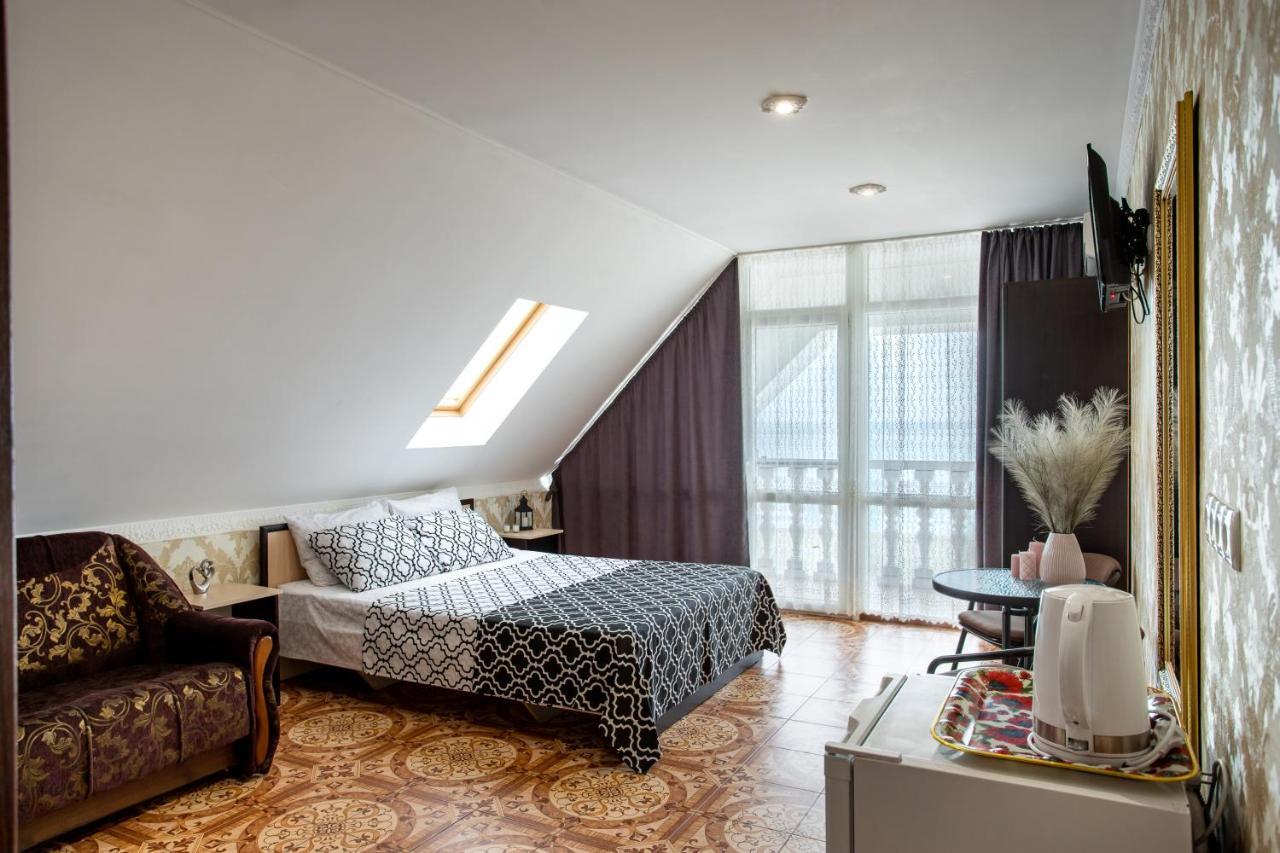 Олимп Hotel Zaliznyi Port Buitenkant foto